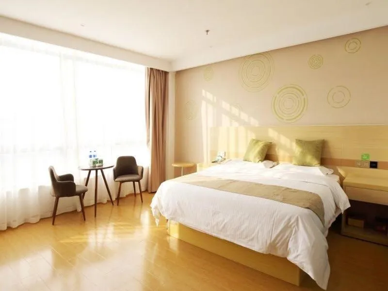Bed in GreenTree Inn Wuxi Jiangyin City Ligang Town Chenshu Road Express Hotel