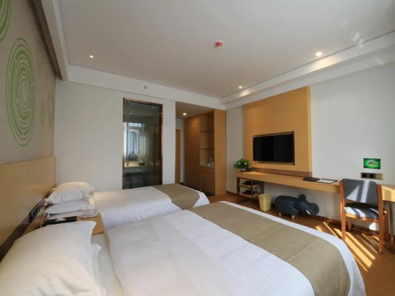 Bed in GreenTree Inn Zhengzhou Gongyi Xinxing Road Business Hotel
