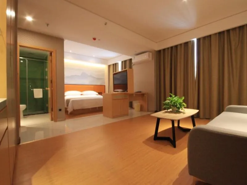 Bed in GreenTree Inn Zhengzhou Gongyi Xinxing Road Business Hotel