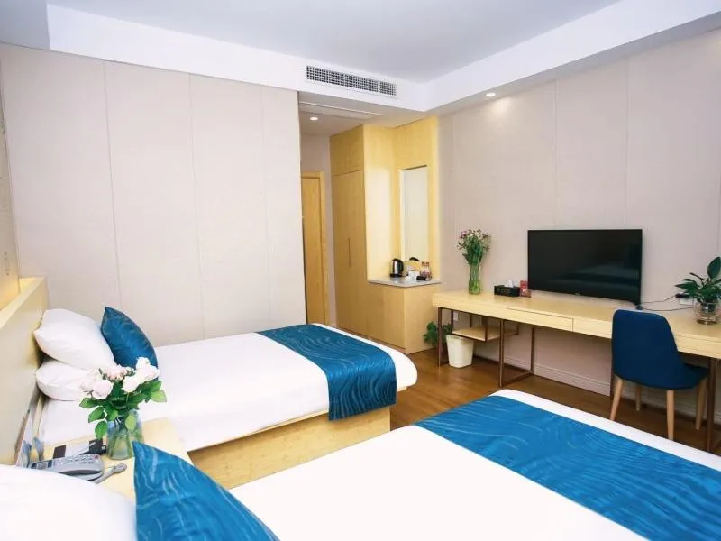 Bed in GreenTree Inn NantongHaian Development Zone Chengdong Town Express Hotel
