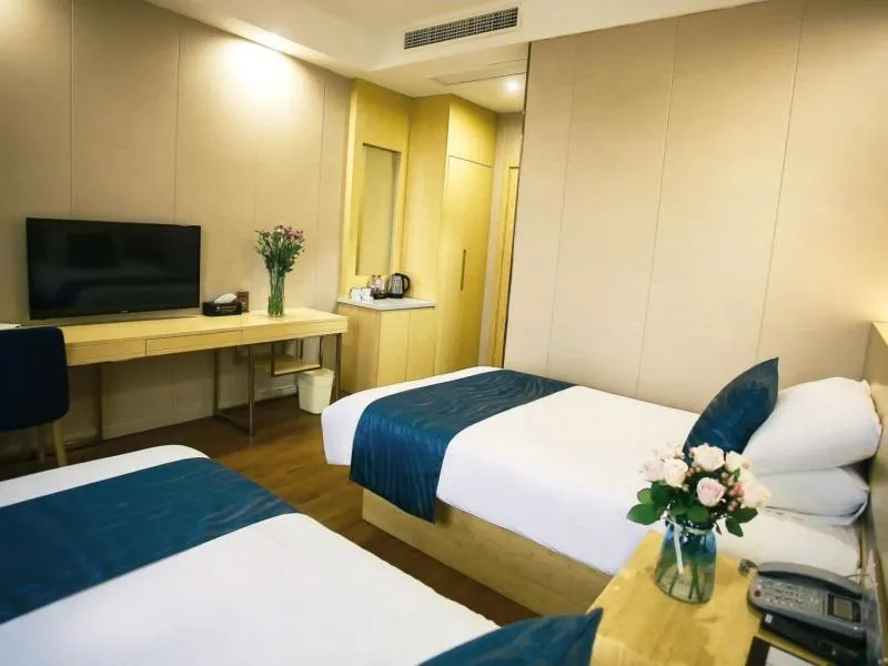 Bed in GreenTree Inn NantongHaian Development Zone Chengdong Town Express Hotel