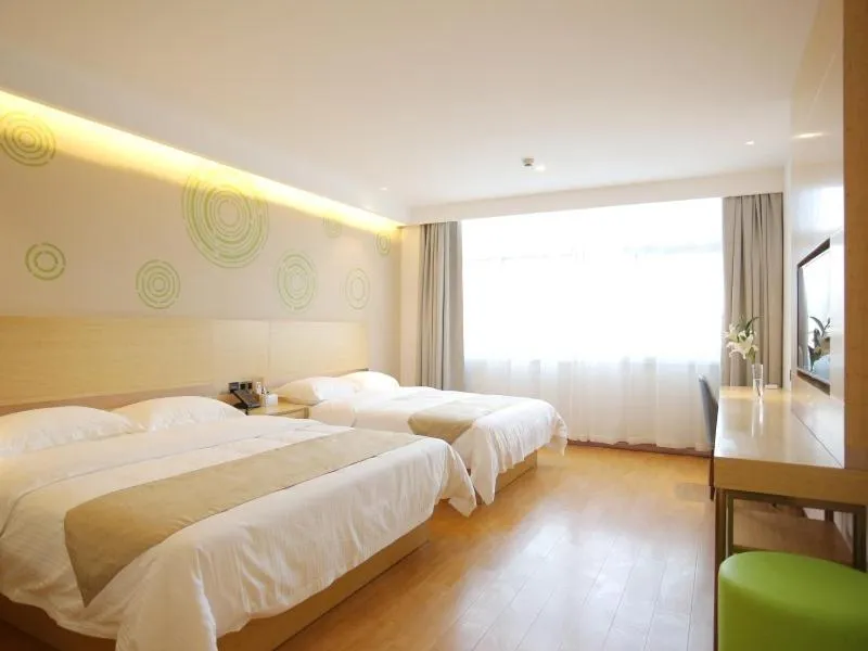 Bed in GreenTree Inn Zaozhuang Xuecheng Qilianshan Road Business Hotel