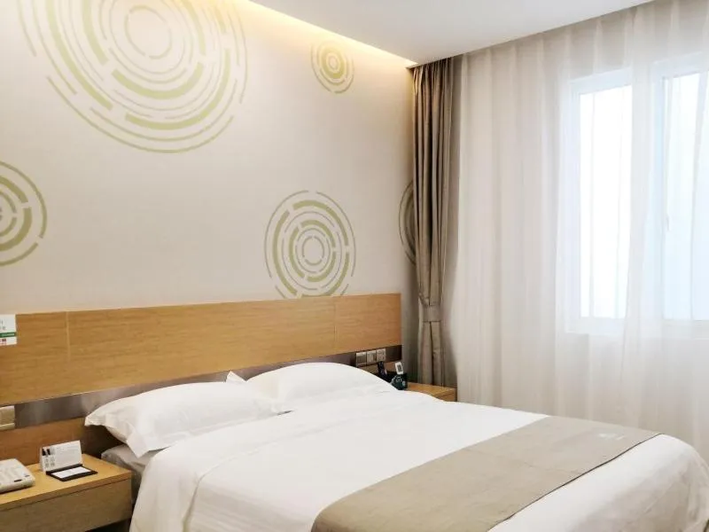 Bed in GreenTree Inn Shanghai Jinshan District Wanda Plaza Longhao Road Express Hotel