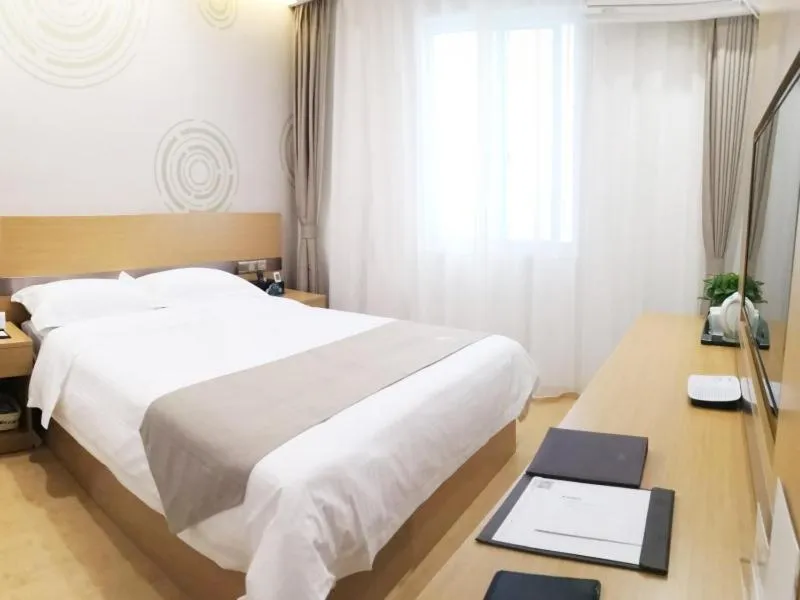 Bed in GreenTree Inn Shanghai Jinshan District Wanda Plaza Longhao Road Express Hotel