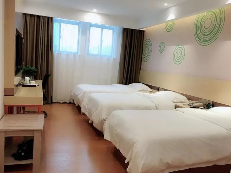 Bed in GreenTree Inn Hefei Lujiang County Yihu West Road Chengxi No.4 Middle School Express Hotel