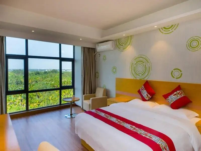 Bed in GreenTree Inn Qionghai Boao Railway Station Business Hotel Bed in GreenTree Inn Qionghai Boao Railway Station Business Hotel