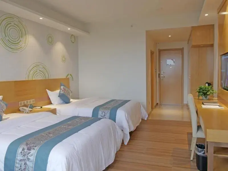 Bed in GreenTree Inn Qionghai Boao Railway Station Business Hotel Bed in GreenTree Inn Qionghai Boao Railway Station Business Hotel