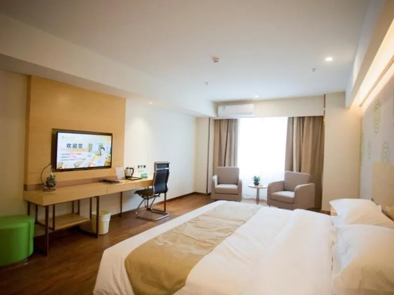 Bed in GreenTree Inn Jinan Tangye Express Hotel