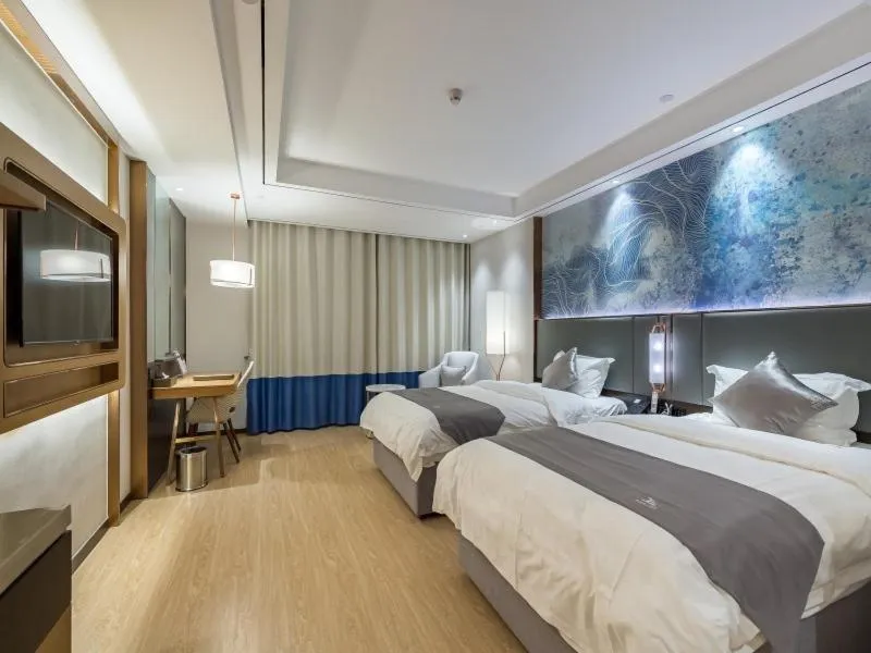 Bed in GYA Xuzhou High Speed Railway Station West Exit Station Hotel