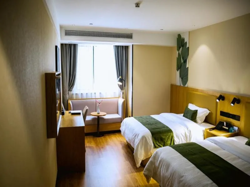 Bed in GreenTree Inn Fuyang Century Fortune Plaza Business Hotel