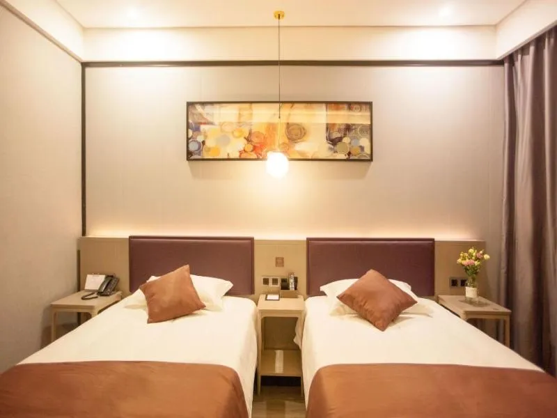 Bed in Gya Jiaxing Tongxiang City Century Avenue Hotel