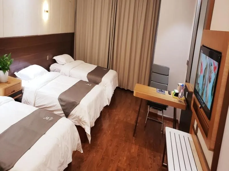 Bed in GreenTree Eastern Rizhao High Speed Railway Station Hotel