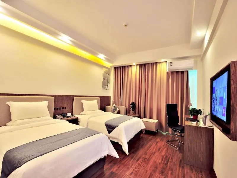 Bed in GreenTree Inn Dongfang City Dongfang Avenue High-speed Railway Station Express Hotel
