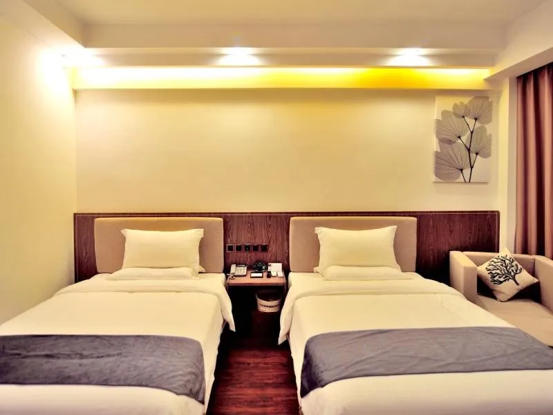 Bed in GreenTree Inn Dongfang City Dongfang Avenue High-speed Railway Station Express Hotel