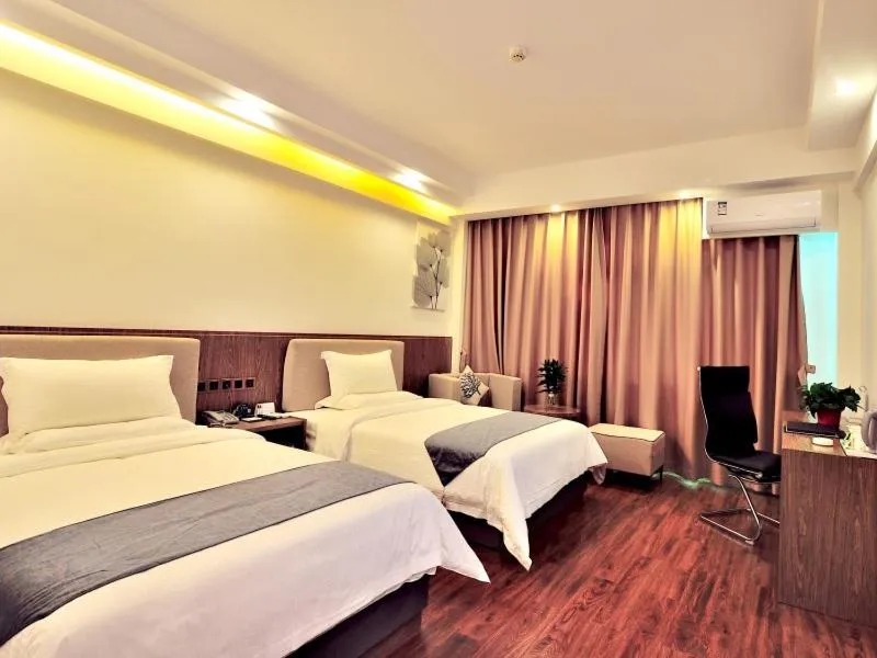 Bed in GreenTree Inn Dongfang City Dongfang Avenue High-speed Railway Station Express Hotel