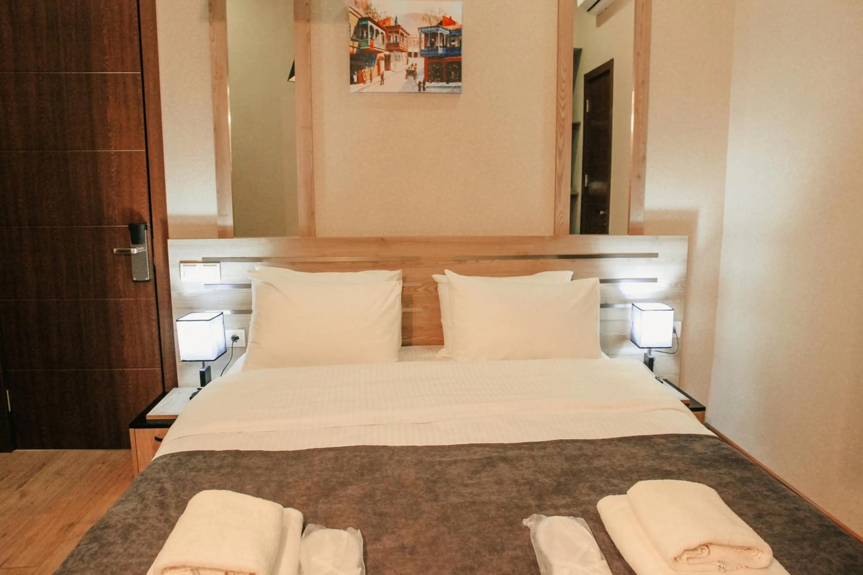 Bed in City Heart Hotel