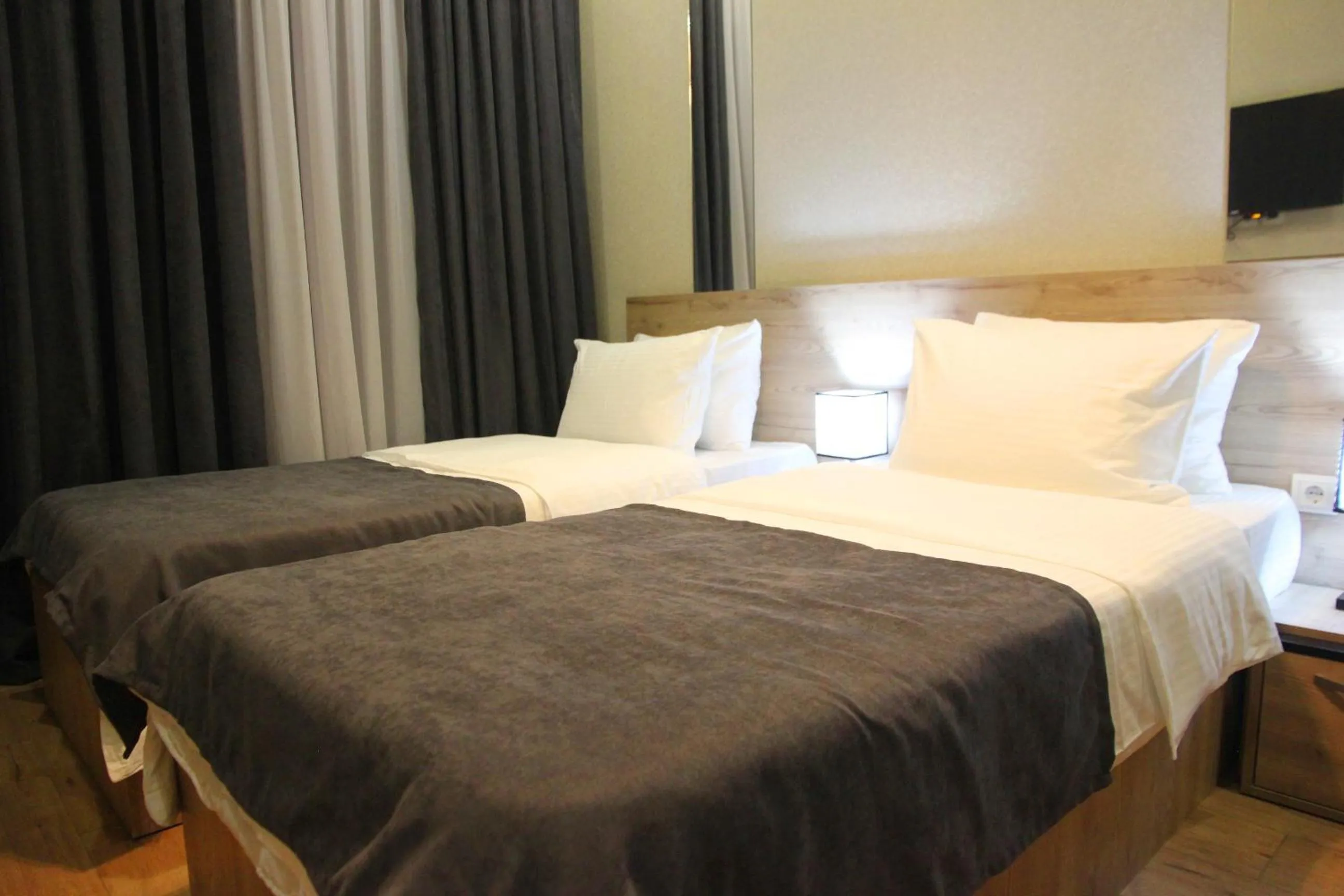Photo of the whole room, Bed in City Heart Hotel