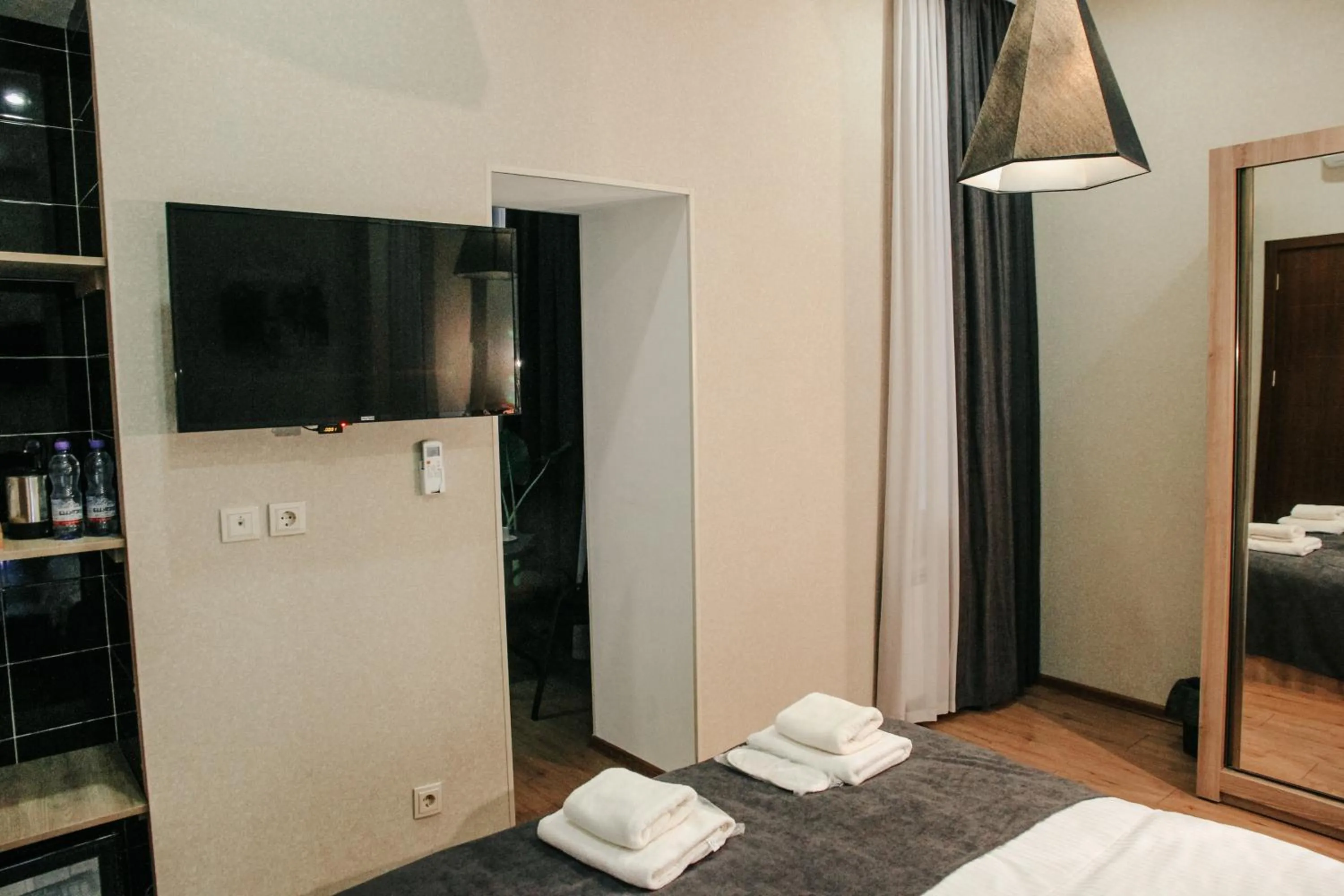 Bed in City Heart Hotel