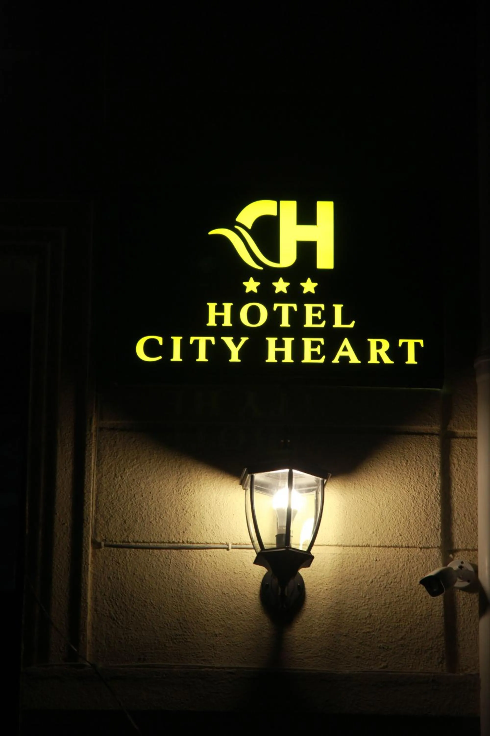 Property logo or sign in City Heart Hotel