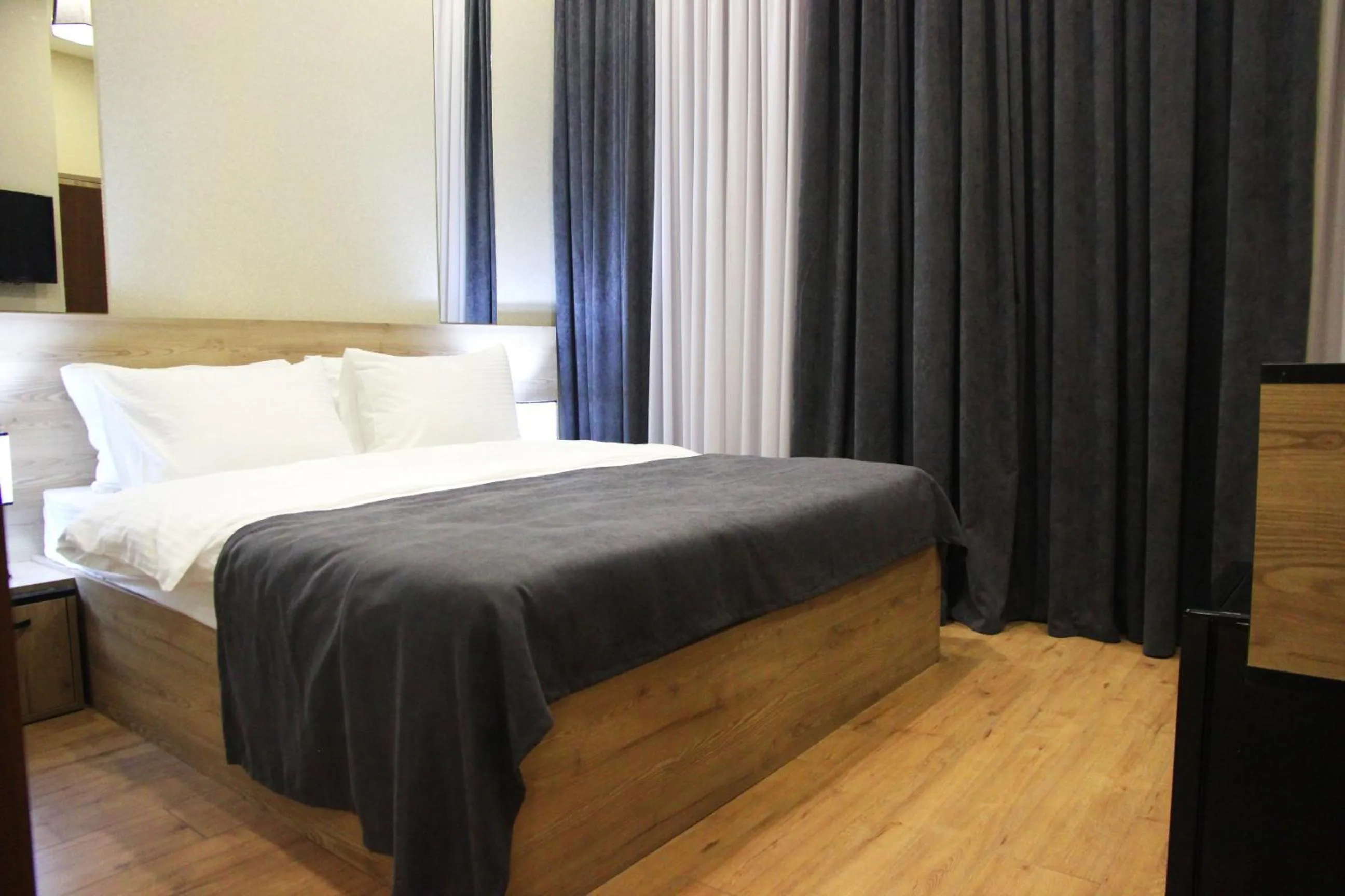 Photo of the whole room, Bed in City Heart Hotel