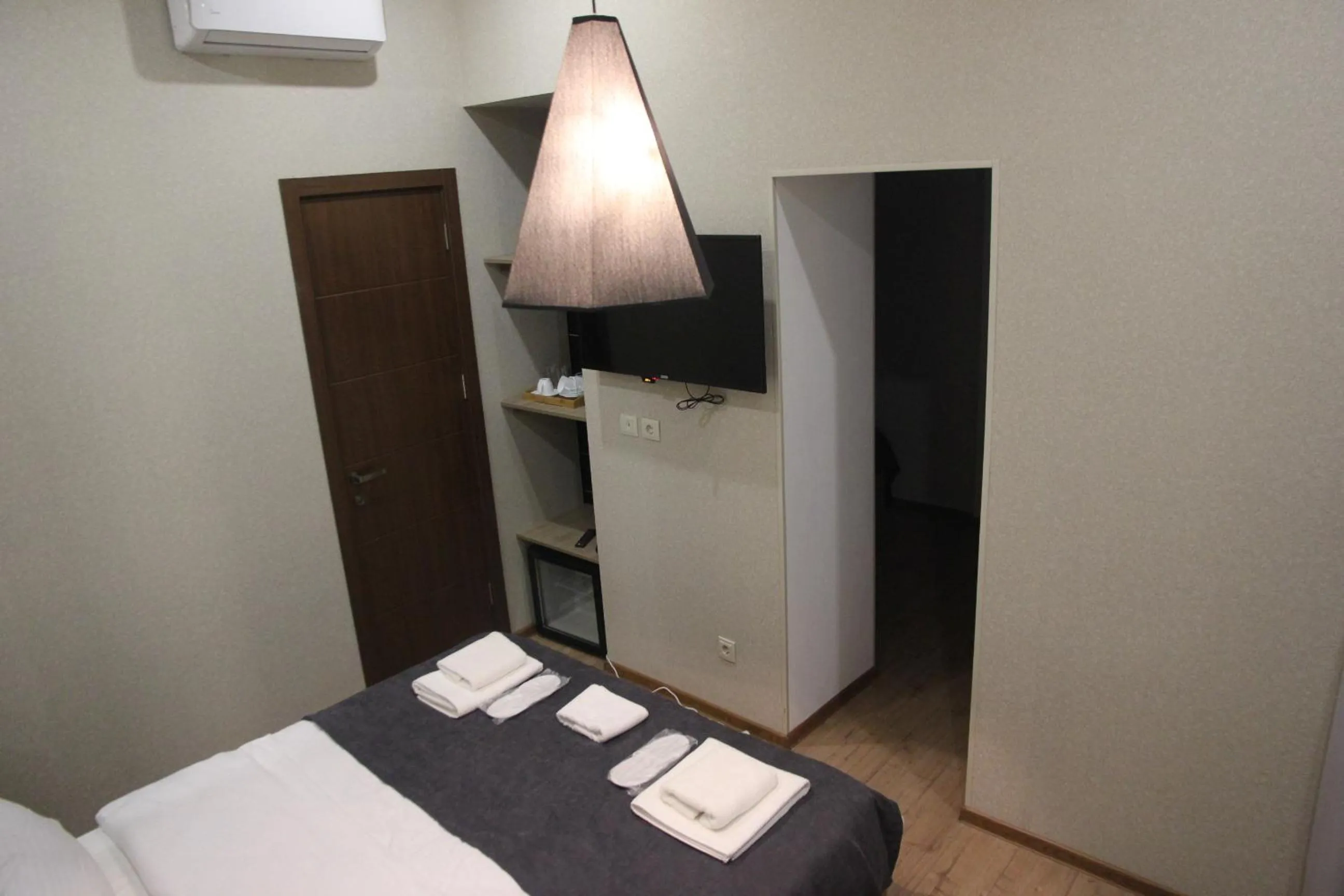 Photo of the whole room, Bed in City Heart Hotel