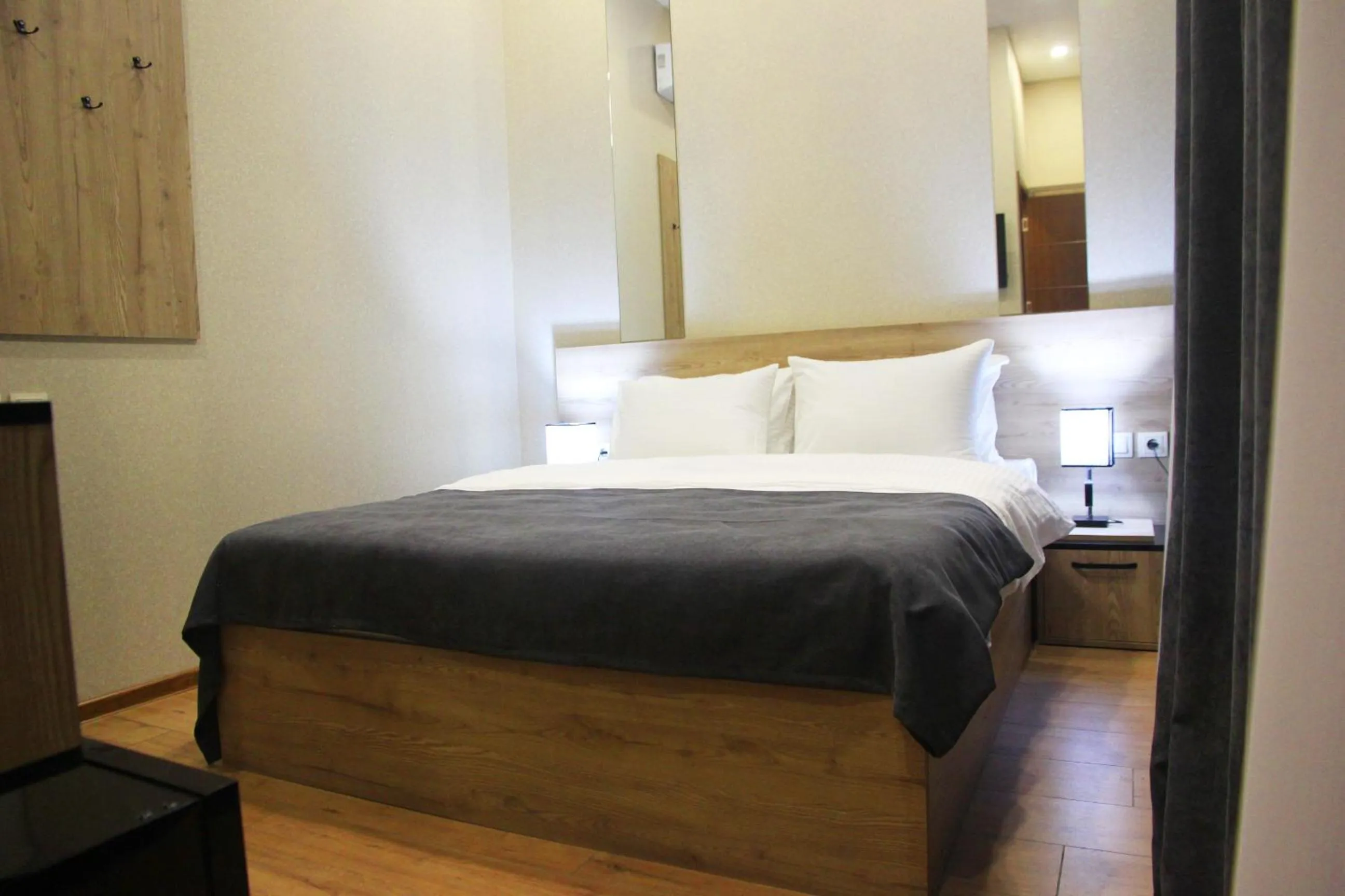 Photo of the whole room, Bed in City Heart Hotel