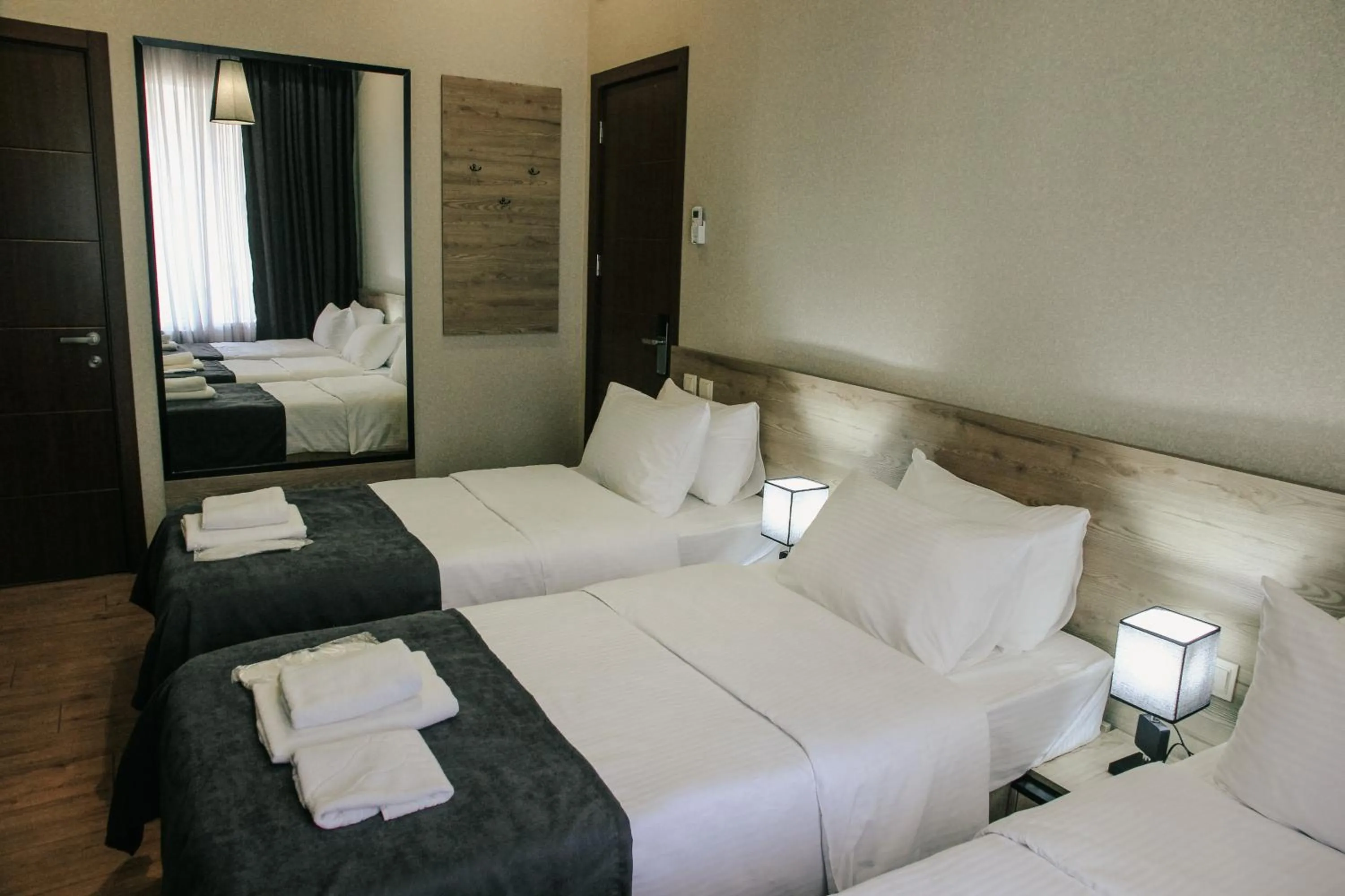 Photo of the whole room, Bed in City Heart Hotel