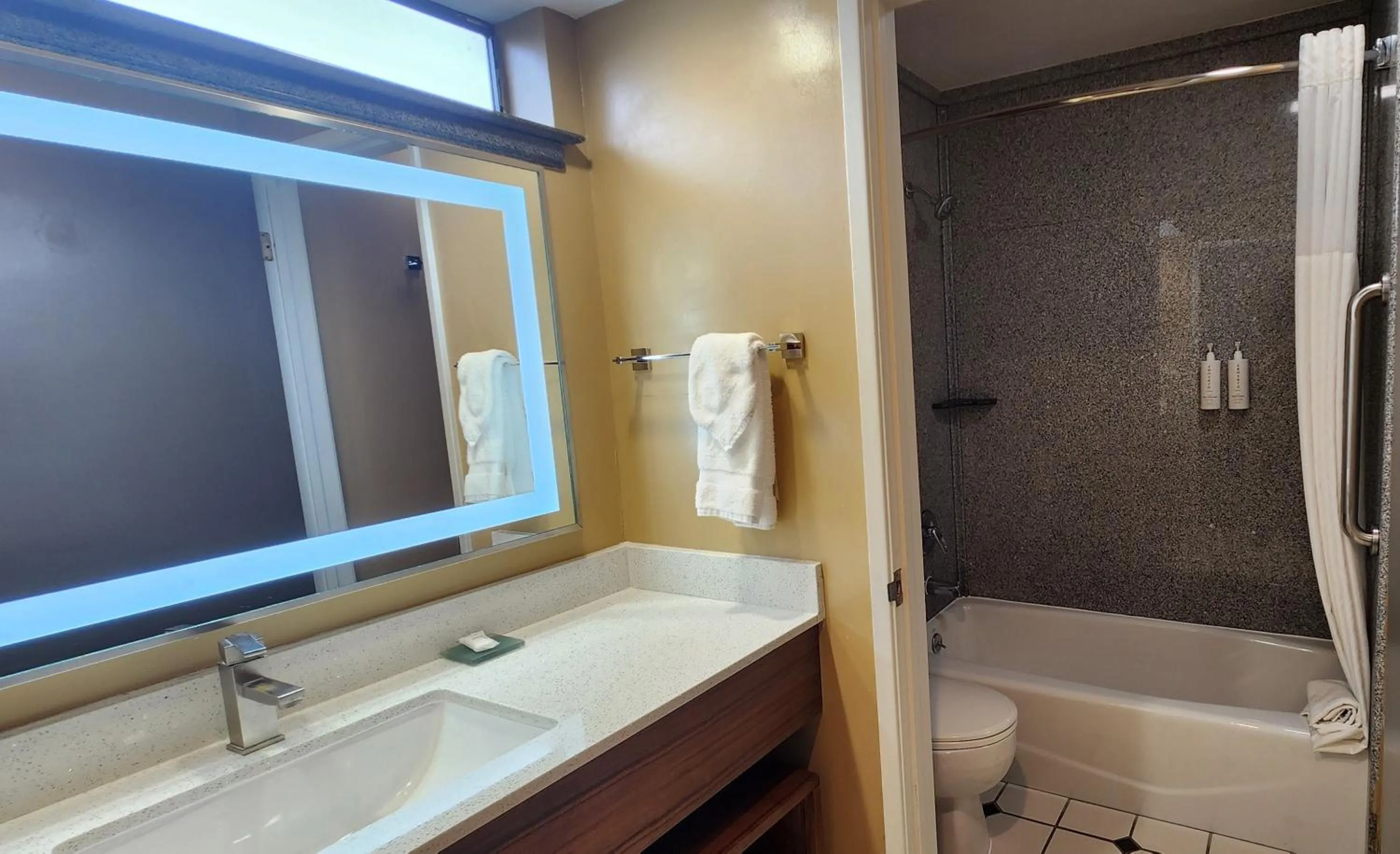 Toilet in La Quinta by Wyndham San Francisco Airport West Millbrae FREE AIRPORT SHUTTLE