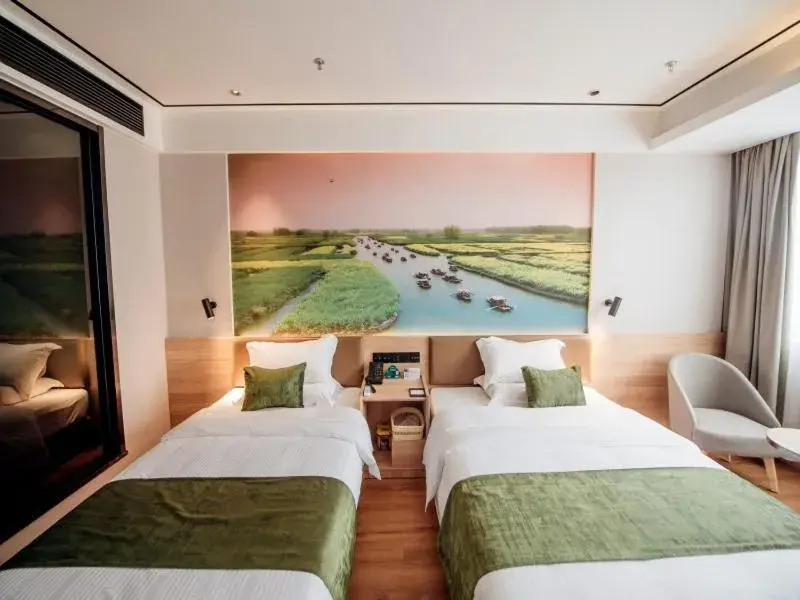Bed in GreenTree Inn Taizhou Xinghua City Zhouzhuang Town Business Hotel Bed in GreenTree Inn Taizhou Xinghua City Zhouzhuang Town Business Hotel