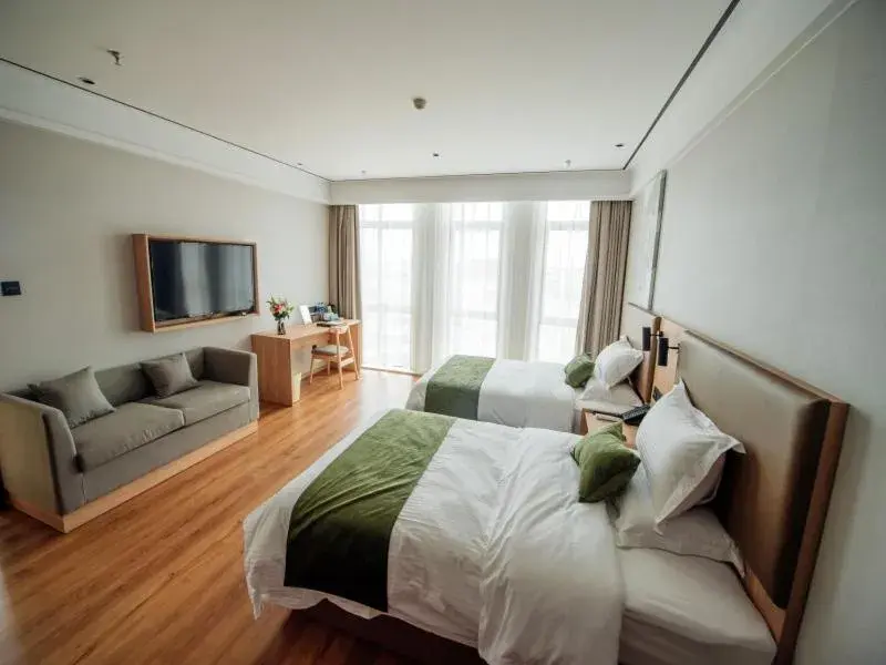 Bed in GreenTree Inn Taizhou Xinghua City Zhouzhuang Town Business Hotel Bed in GreenTree Inn Taizhou Xinghua City Zhouzhuang Town Business Hotel