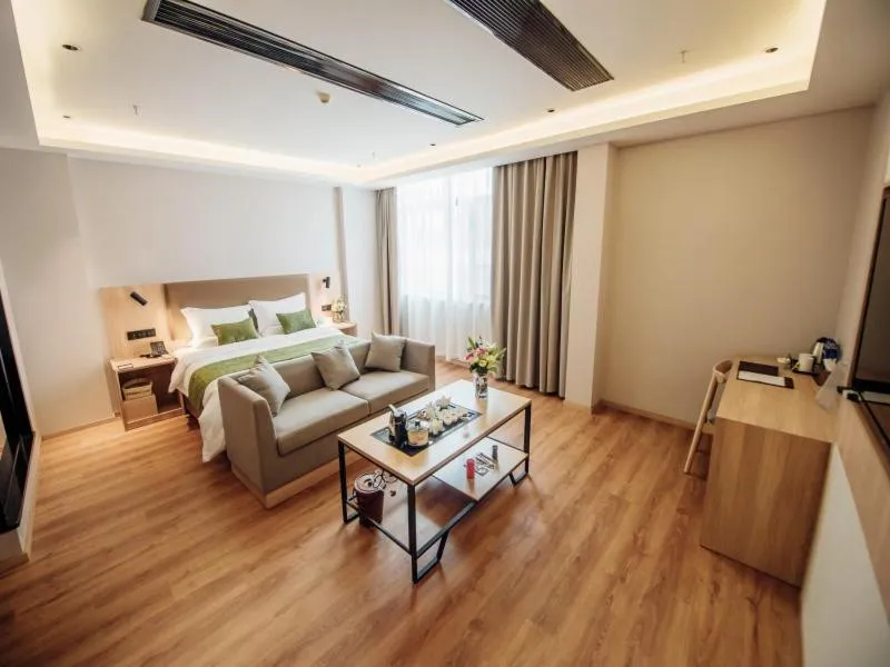 Bed in GreenTree Inn Taizhou Xinghua City Zhouzhuang Town Business Hotel
