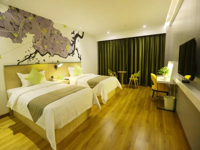 Bed in Vatica Huanggang Luotian County City Square Hotel