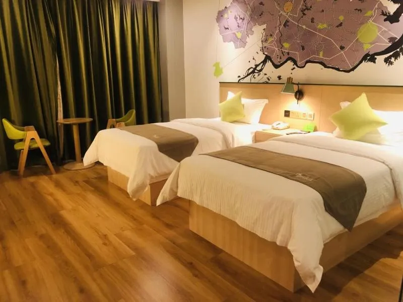 Bed in Vatica Huanggang Luotian County City Square Hotel
