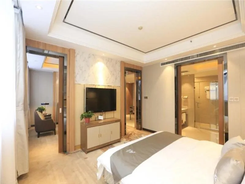 Bed in GreenTree Eastern Bengbu City Guzhen County Century Hotel