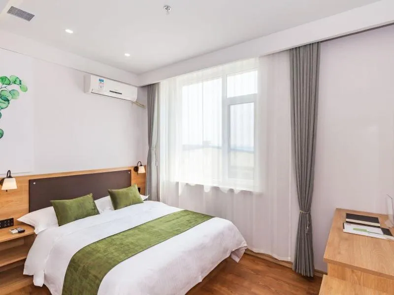 Bed in GreenTree Inn Dalian Airport New District Xinzhaizi Express Hotel