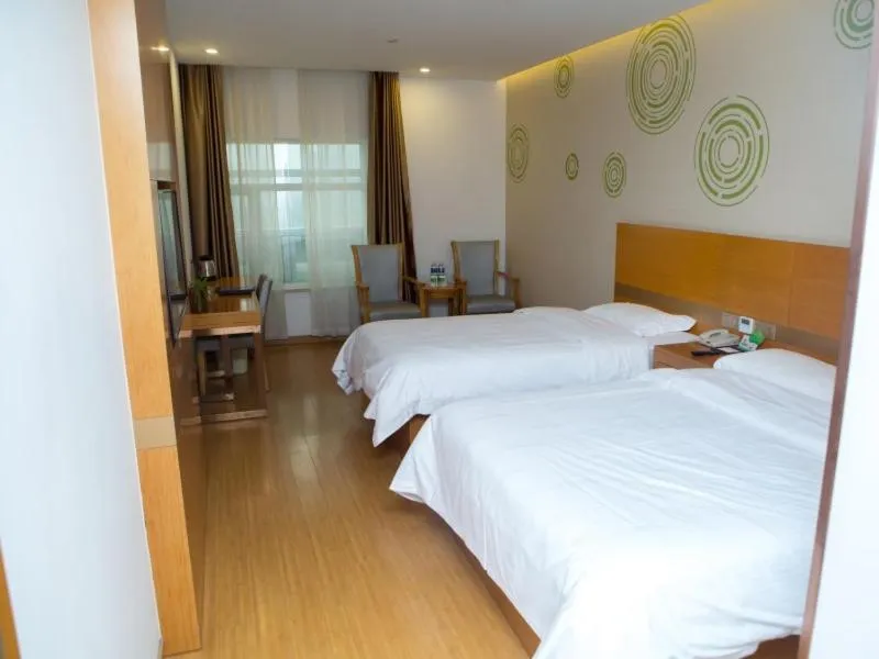 Bed in GreenTree Inn Yangzhou Railway Station Jinzhankou Business Hotel