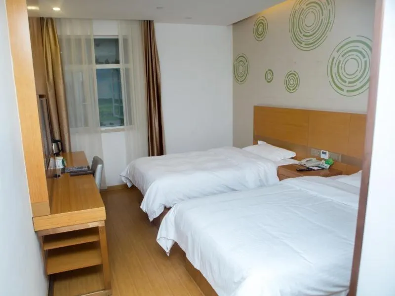 Bed in GreenTree Inn Yangzhou Railway Station Jinzhankou Business Hotel