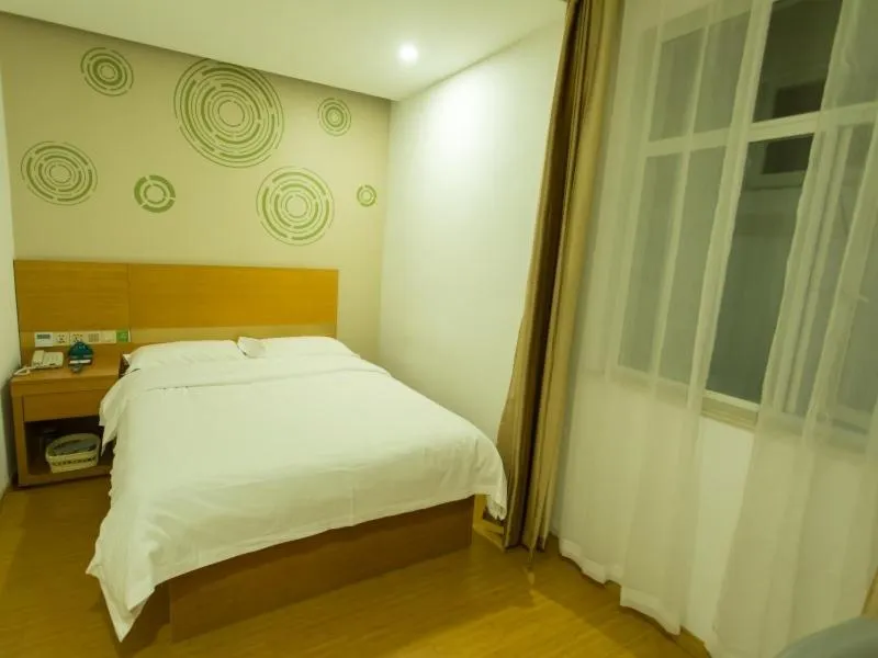 Bed in GreenTree Inn Yangzhou Railway Station Jinzhankou Business Hotel