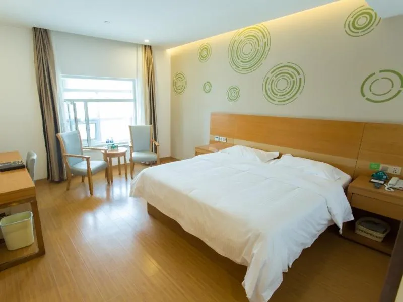 Bed in GreenTree Inn Yangzhou Railway Station Jinzhankou Business Hotel