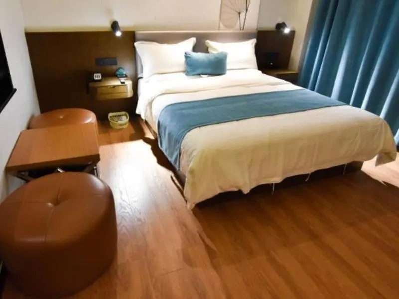 Bed in GreenTree Rizhao Lanshan Coach Station Hotel