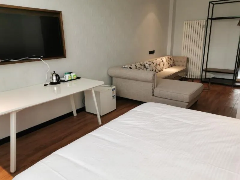 Bed in GreenTree Rizhao Lanshan Coach Station Hotel