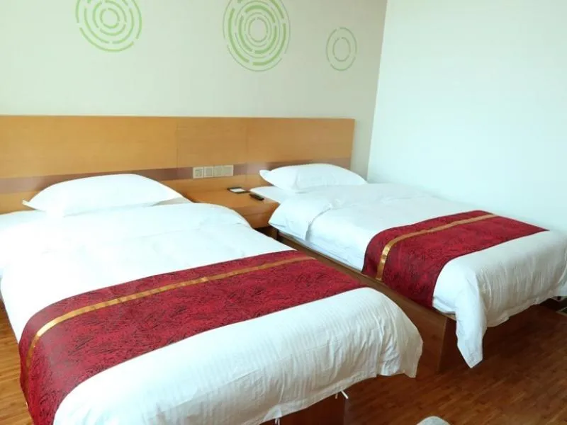 Bed in GreenTree Inn Beijing Huairou District Beifang Town Xingfu Avenue Business Hotel