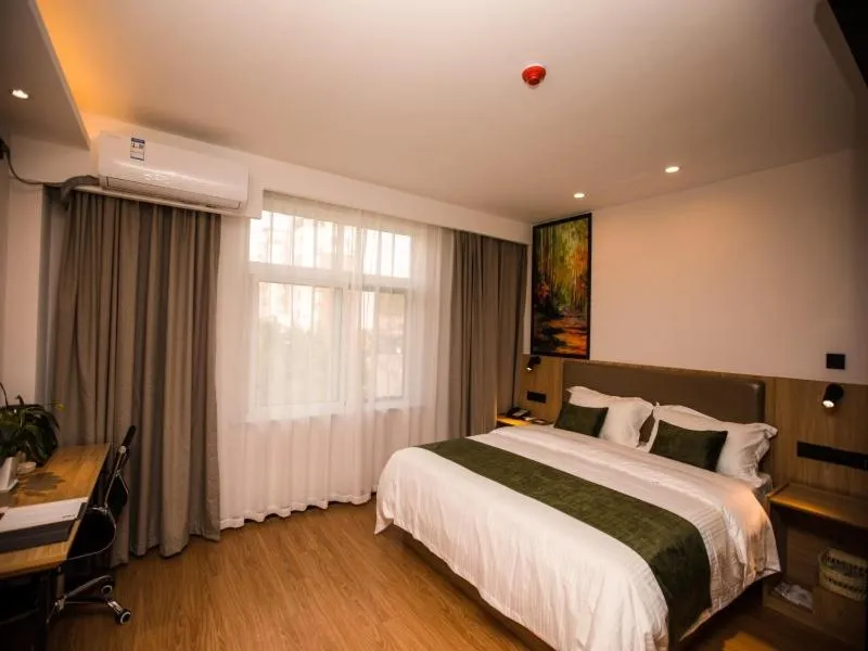 Bed in GreenTree Inn Qingdao Huangdao District Jinshatan Road Jinshatan Hotel