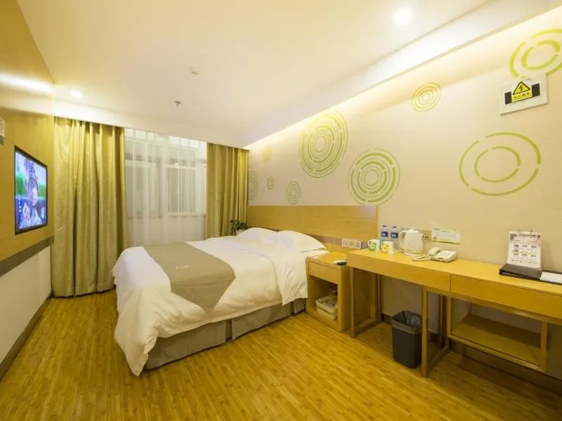Bed in GreenTree Inn Beijing Tongzhou District Xuxinzhuang Subway Station Express Hotel
