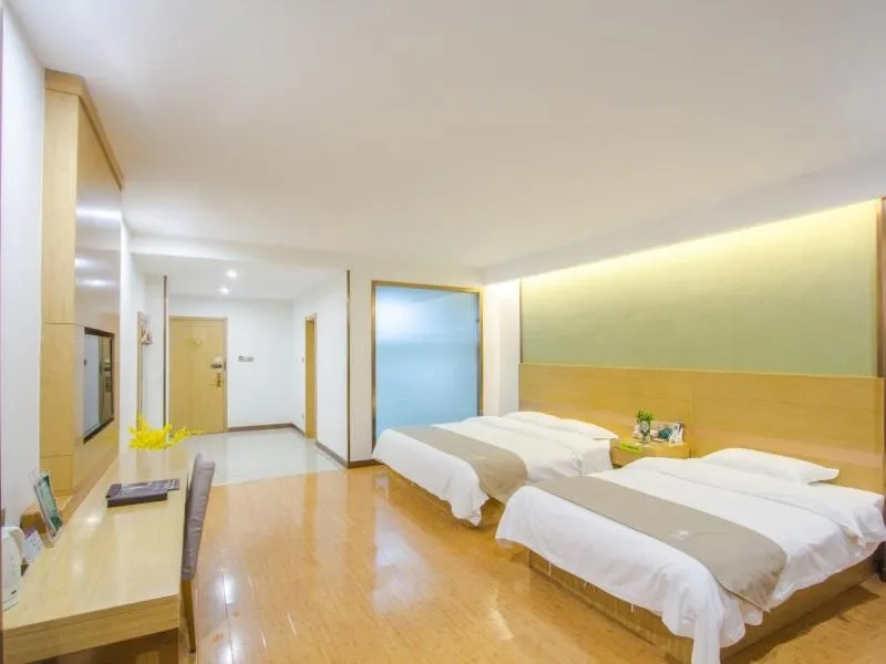 Bed in GreenTree Inn Xingxincheng Town Jiayuan Central Plaza Business Hotel