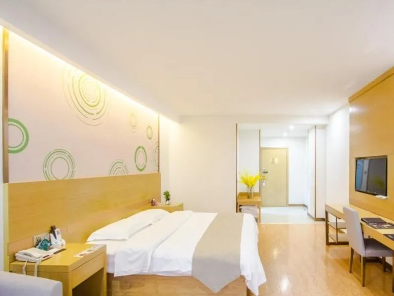 Bed in GreenTree Inn Xingxincheng Town Jiayuan Central Plaza Business Hotel