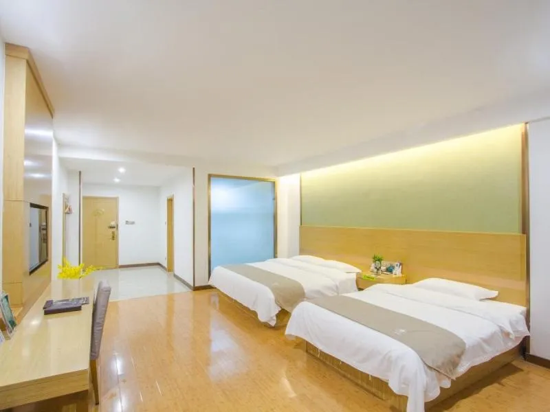 Bed in GreenTree Inn Xingxincheng Town Jiayuan Central Plaza Business Hotel