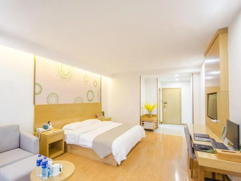 Bed in GreenTree Inn Xingxincheng Town Jiayuan Central Plaza Business Hotel