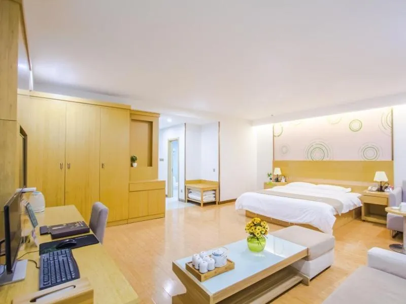 Bed in GreenTree Inn Xingxincheng Town Jiayuan Central Plaza Business Hotel