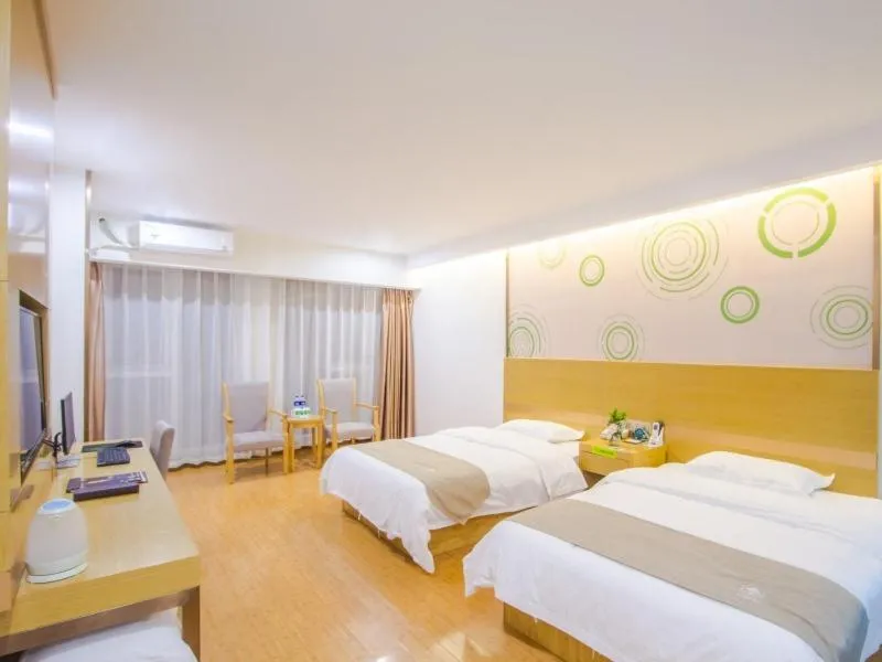 Bed in GreenTree Inn Xingxincheng Town Jiayuan Central Plaza Business Hotel